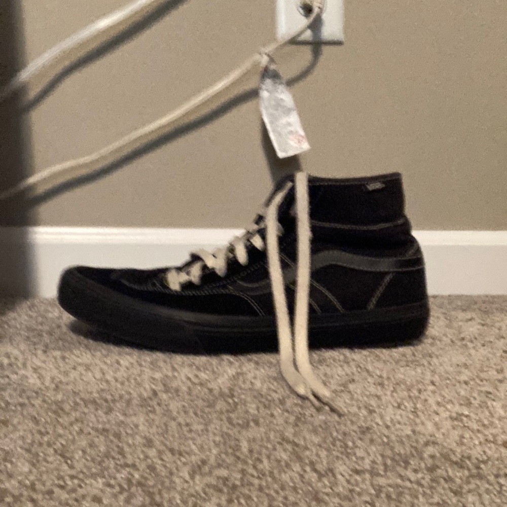 11.5 hardly ever worn black and white vans